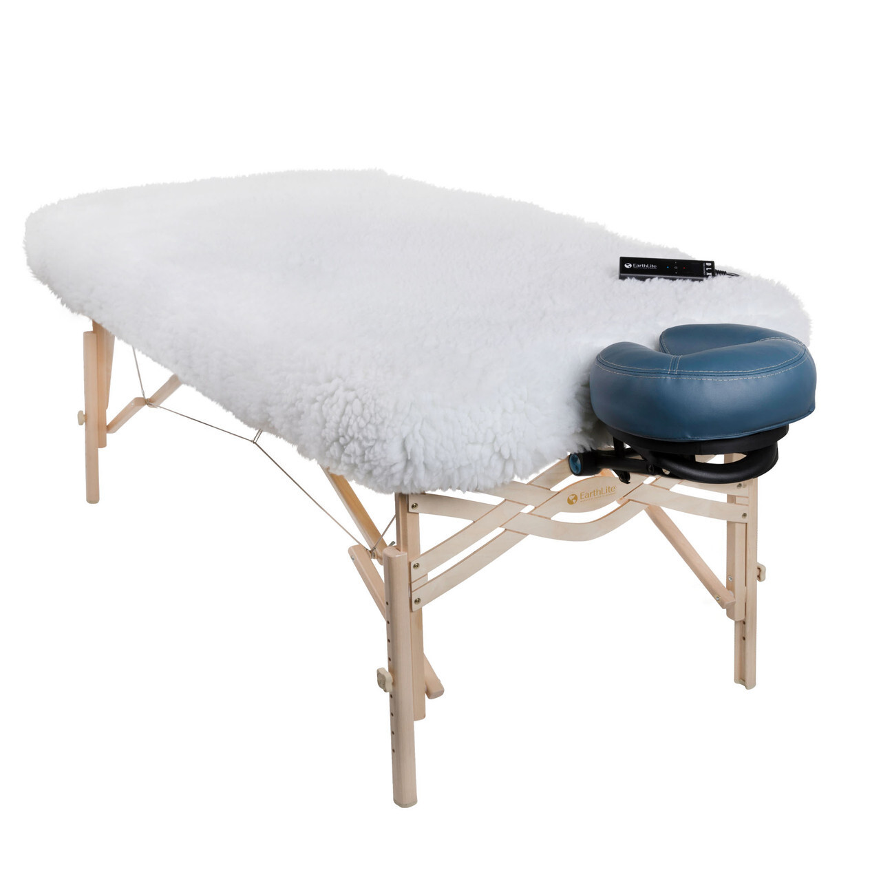 Portable Massage table with fleece cover and headrest.