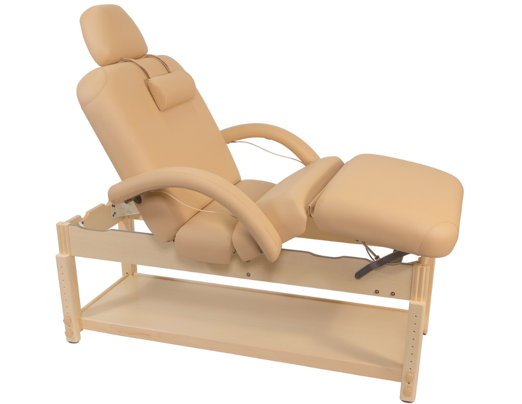 Beige adjustable massage table with multiple cushioned sections.