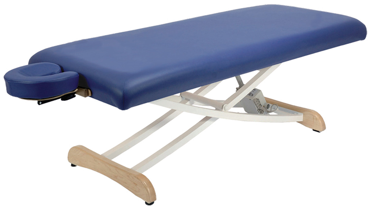 Blue massage table with wooden base and headrest.